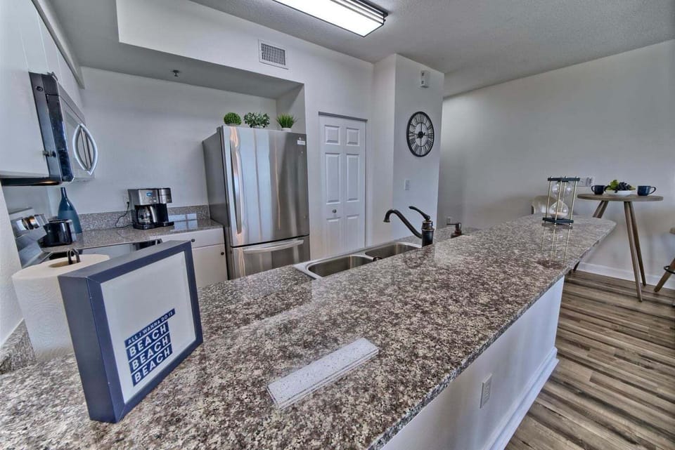 Full kitchen with all the cooking essentials and modern appliances built for a chef