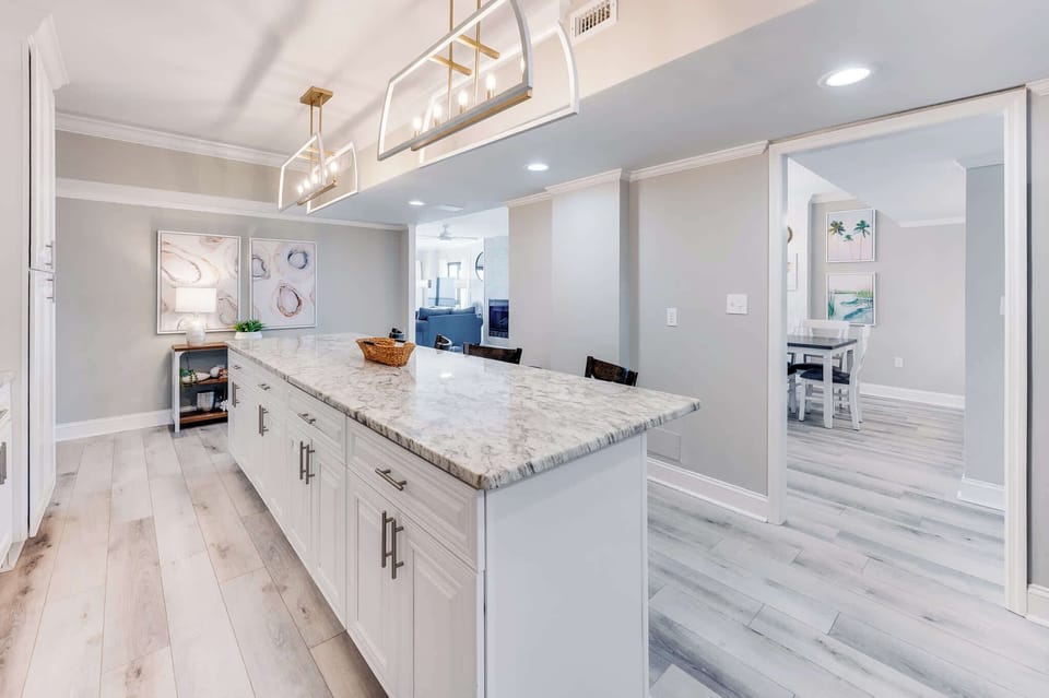 Enjoy cooking and entertaining in Chef's kitchen with 4 barstools at kitchen island