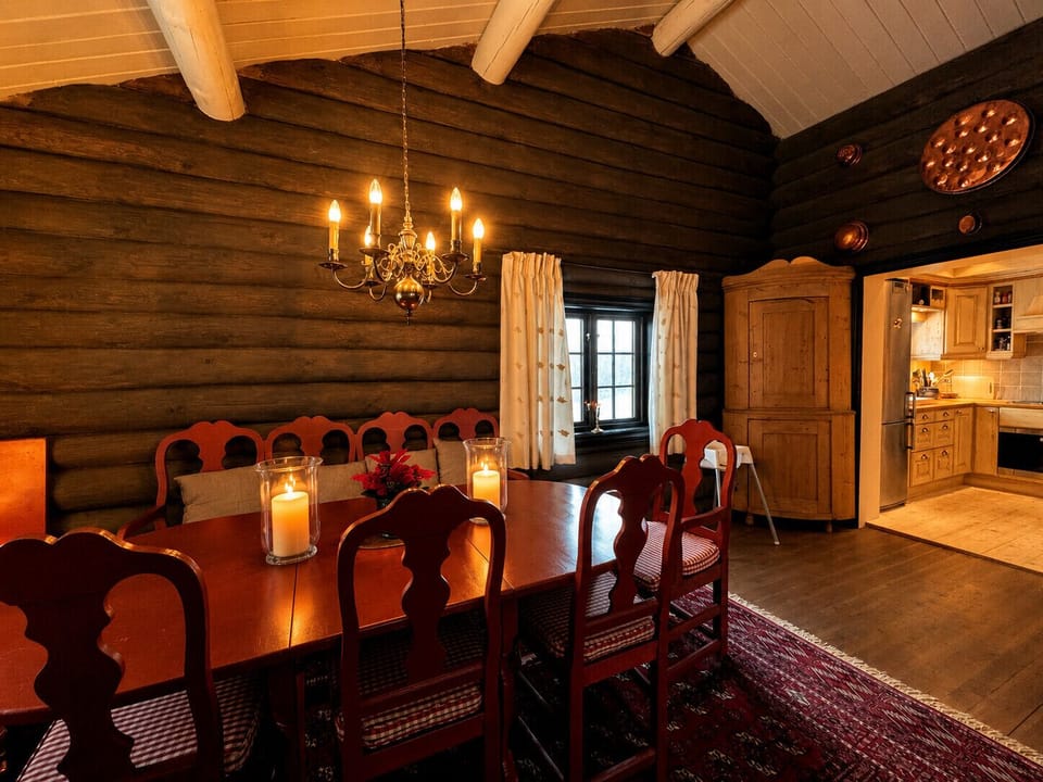 Comfortable dining space with natural light and seating for whole family