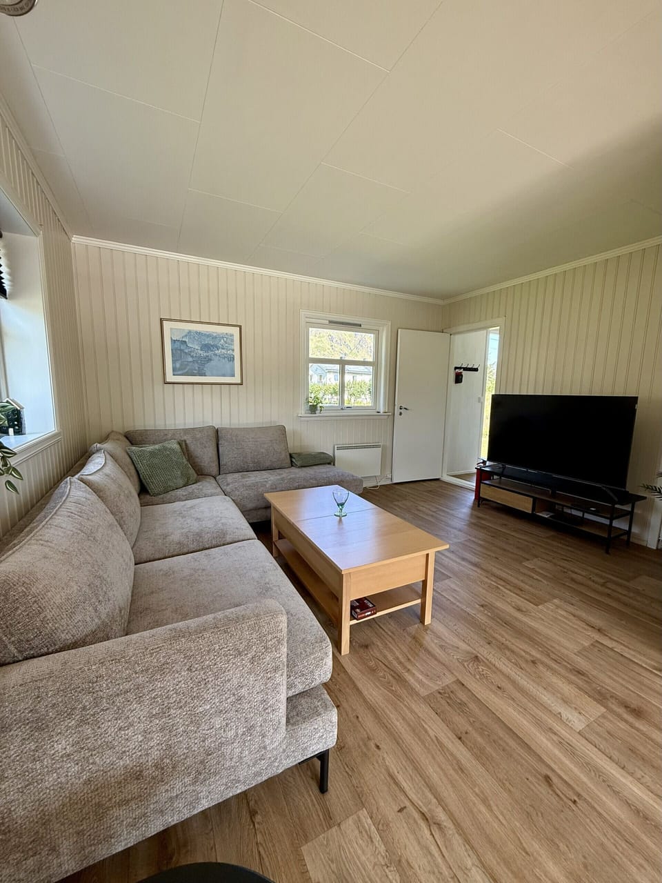 Comfy living-room with TV.