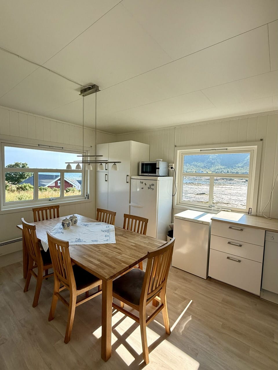 Kitchen with a large dining table and gorgeous views!