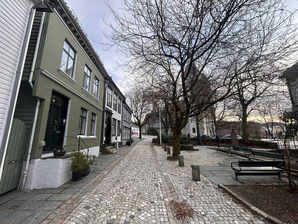 The apartment is located in a cosy brick covered street