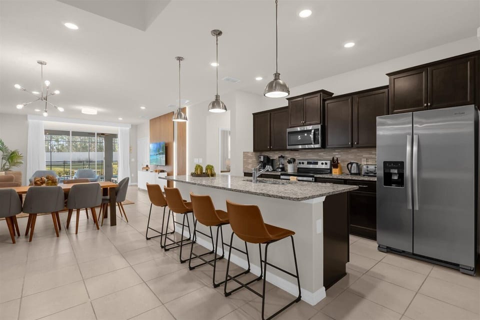Kitchen Area, with Breakfast Bar for 4 People and Dining Area