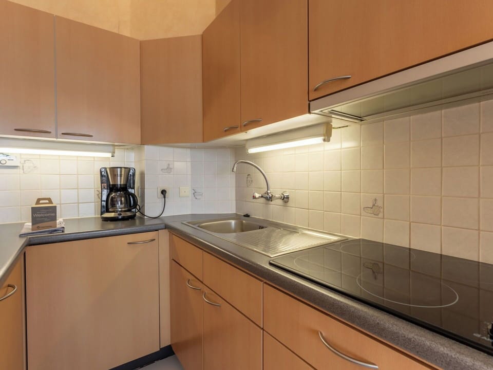 Kitchen, Countertop, Kitchen Appliance, Interior Design, Flooring, Major Appliance, Floor, Cabinetry, Kitchen Sink, Room