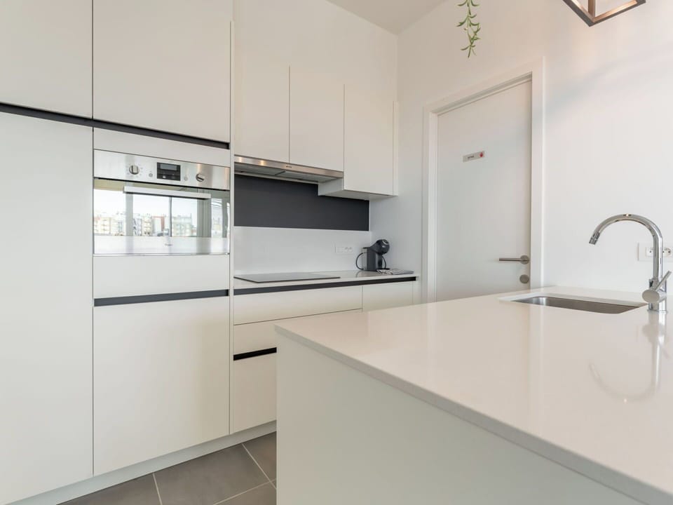 Kitchen, Countertop, Kitchen Appliance, Interior Design, Flooring, Wood, Cabinetry, Floor, Major Appliance, Ceiling