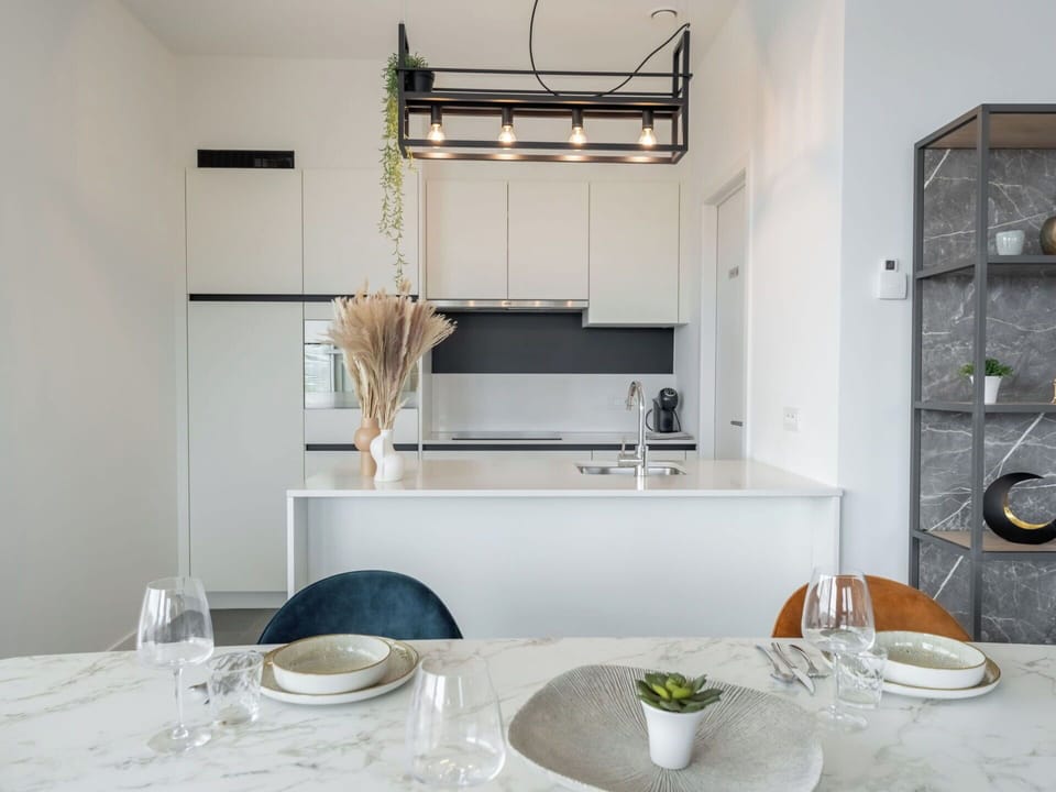 Furniture, Interior Design, Kitchen, Countertop, Wall, Flooring, Light Fixture, Wood, Ceiling, Kitchen & Dining Room Table