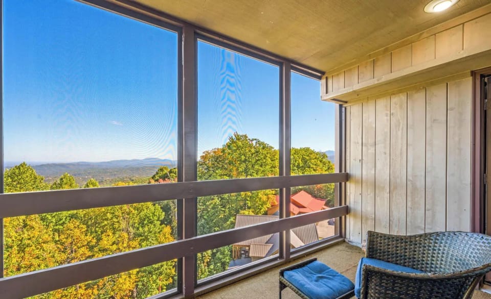 Your private balcony offers stunning mountain views where you can unwind with morning coffee while surrounded by colorful autumn foliage.