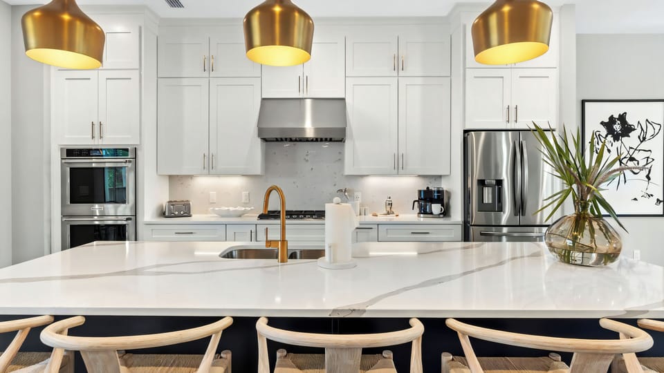 A refined coastal kitchen designed for cooking, gathering, and lingering conversations.