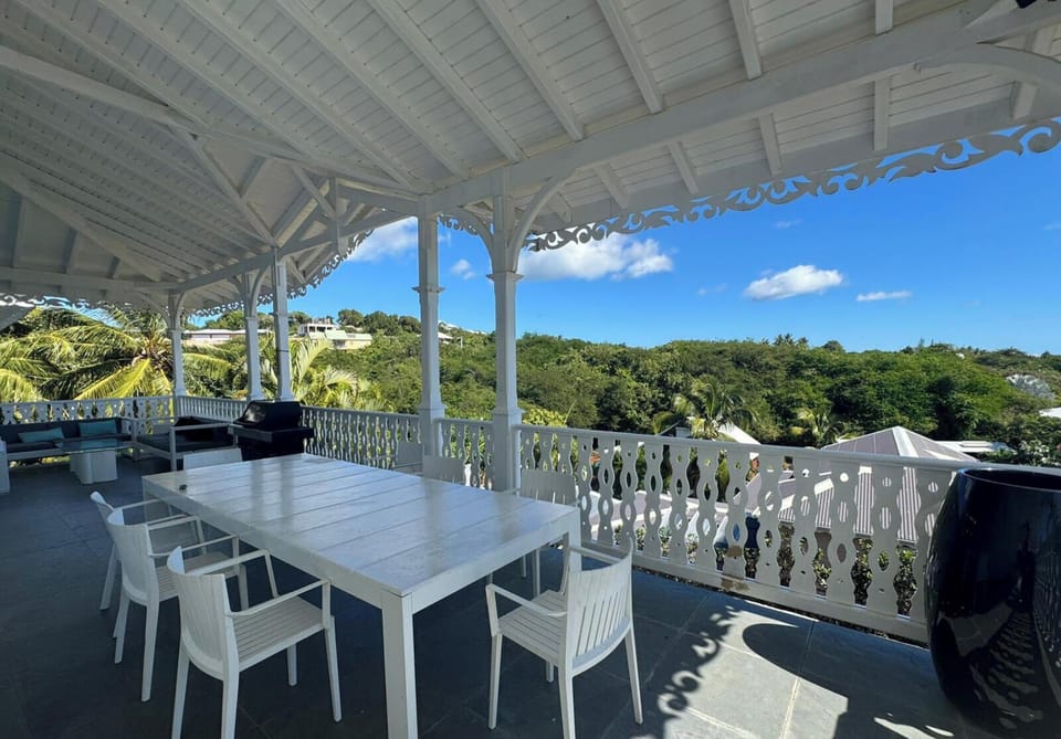 Breathtaking view of the turquoise lagoon of Saint-François and the Caribbean Sea from Villa Miralya.