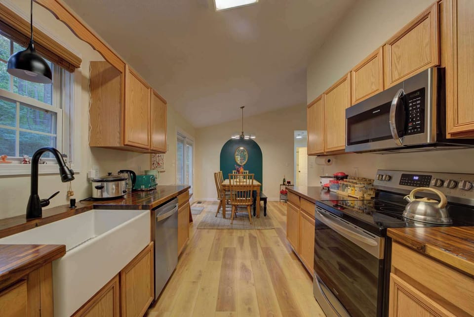 Kitchen with a long galley layout—made for cooking together without getting in each other’s way.