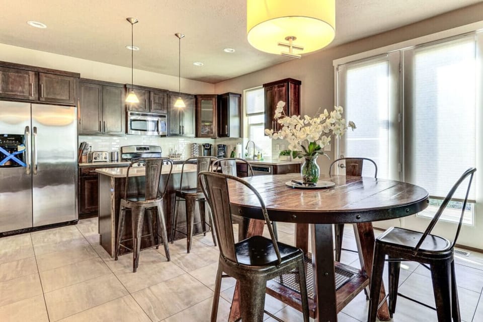 Dining Space | Rustic Table, Natural Light & Seamless Layout