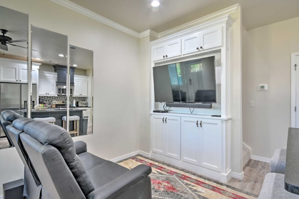 Living Room | Wall Mounted TV | Cabinet Storage & Open Kitchen
