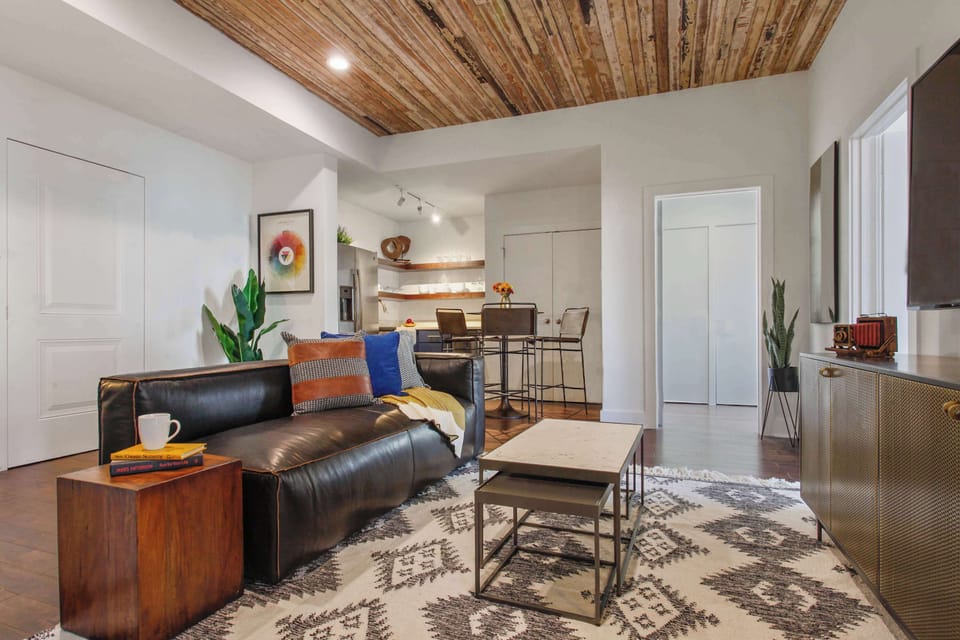 Unit 204 | Open Concept Living Room | XL Flat Screen TV | Wood Ceiling | Second Floor
