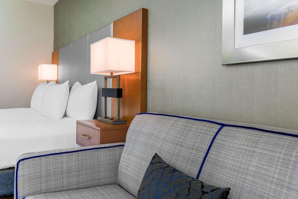 Lounge comfortably with soft textures and calming modern décor.