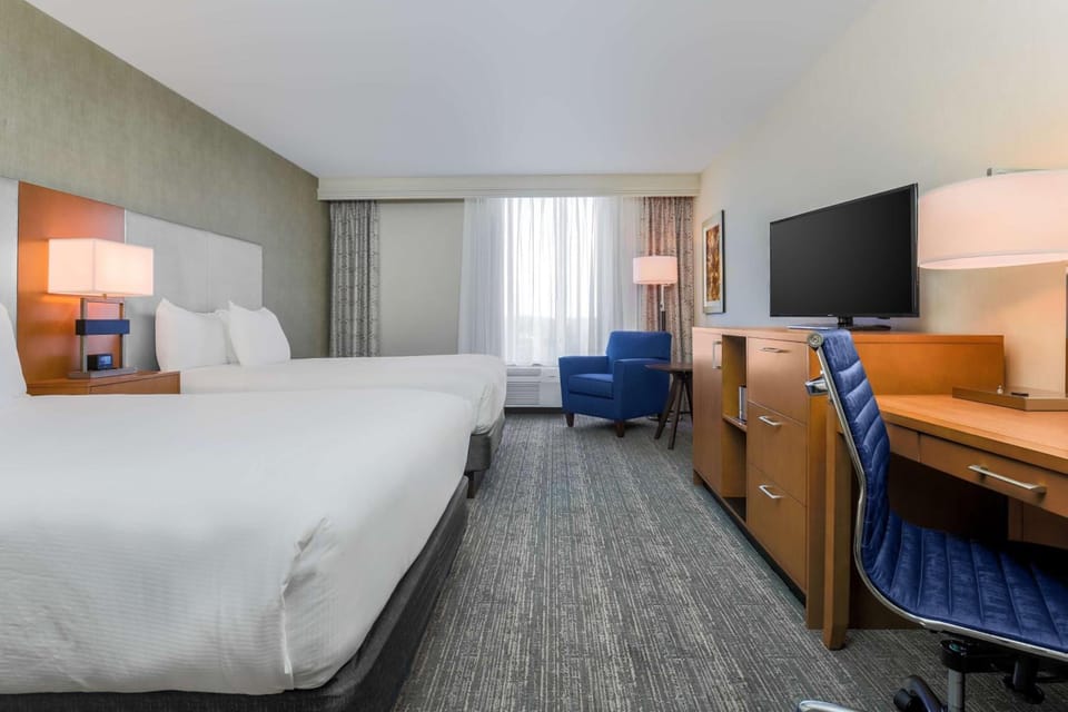 Stretch out on crisp linens in a bright double-bed room.