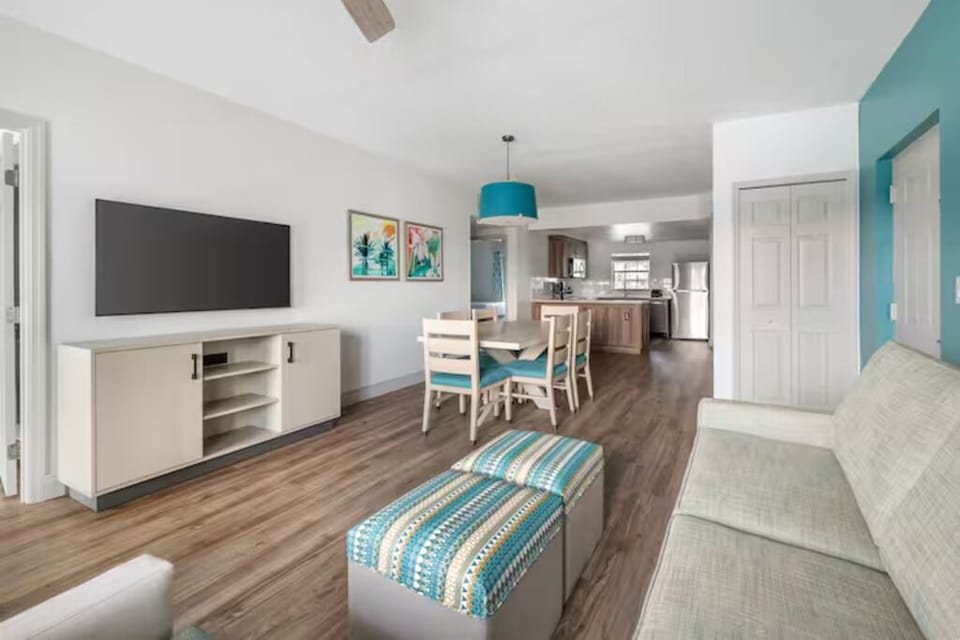 Gather for meals and movies in this open-plan suite.