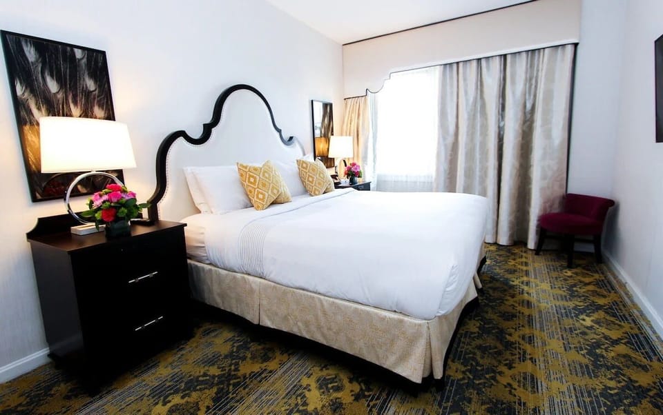 Unwind in crisp linens and a plush, cloudlike bed.