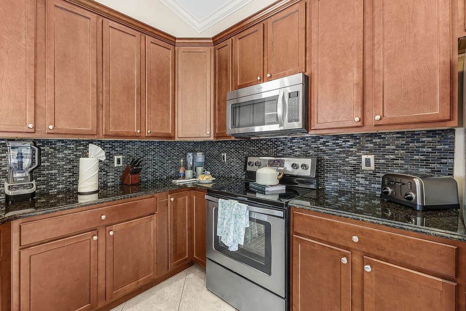 Modern appliances and a clean look round out this kitchen