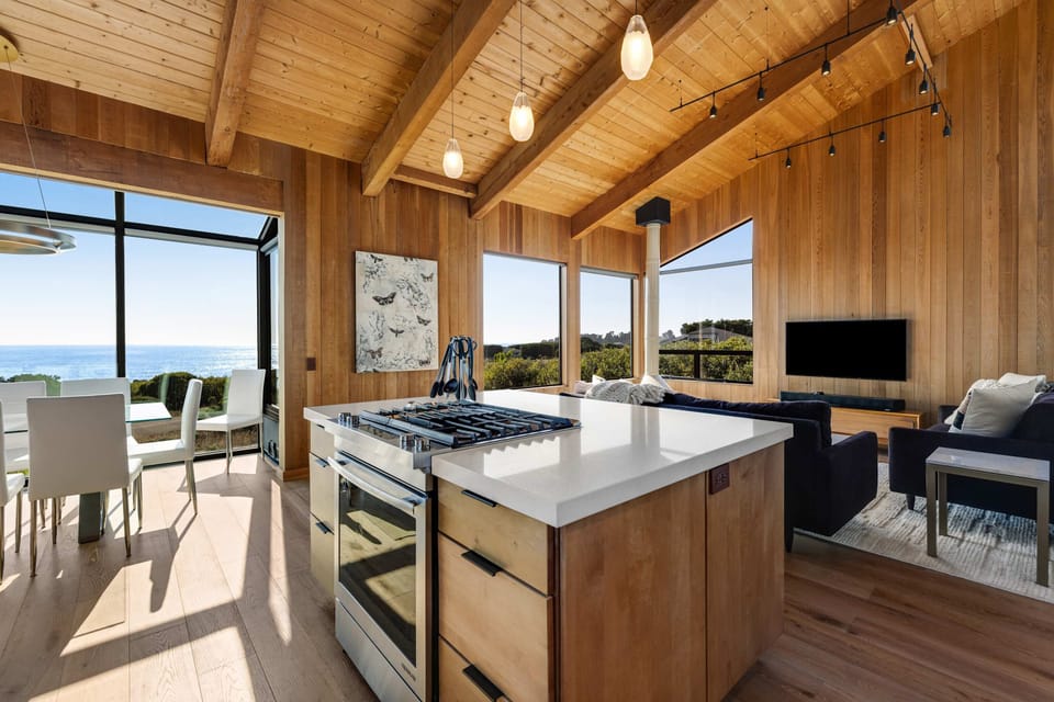 Appreciate the seamless flow between cooking and entertaining in this bright kitchen, where every meal can become a delightful event.