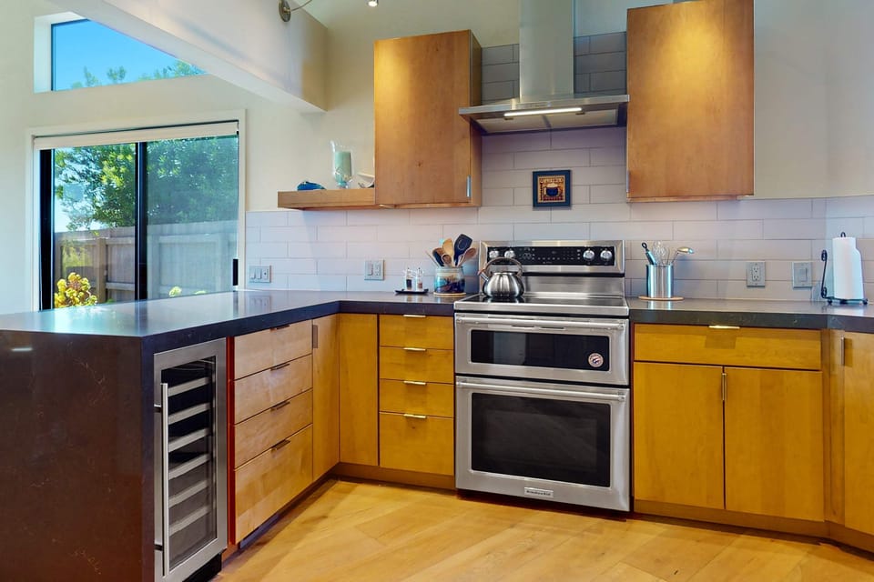 Experience cooking with a view in this contemporary kitchen, designed to inspire your inner chef.