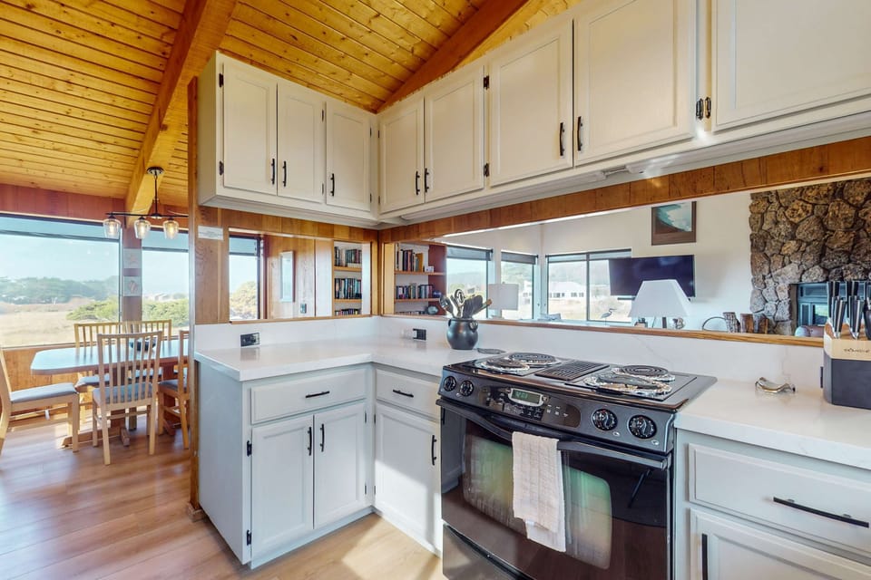 With sweeping views from the kitchen window, you'll be inspired to whip up gourmet meals while staying connected to the beauty outside.