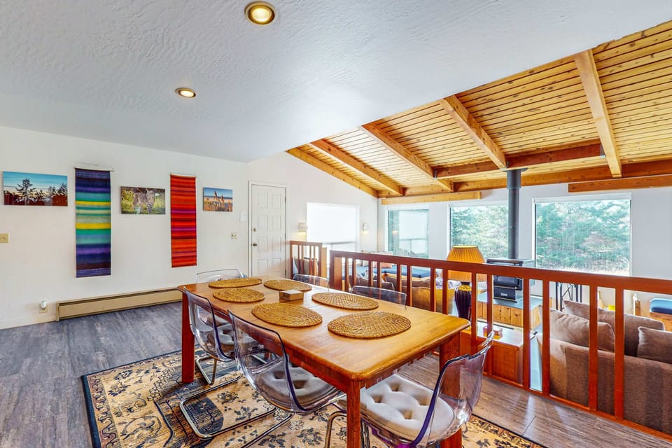 Bask in the natural light of the dining space, a perfect setting for enjoying breakfasts or planning your day's adventures.