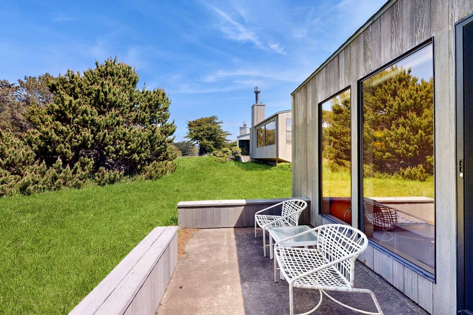 Soak in the sun on the outdoor deck, where you can enjoy the peaceful ambiance of your coastal escape.