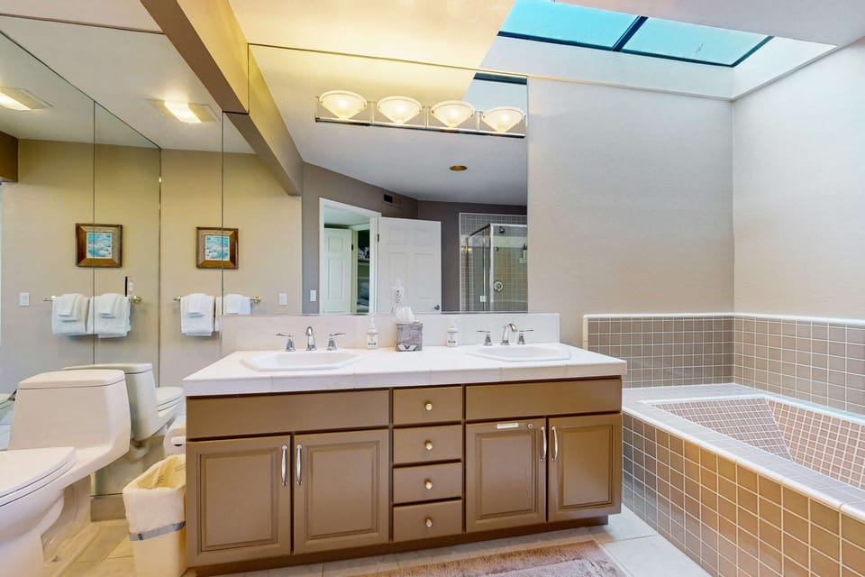 Refresh and rejuvenate in this luxurious bathroom, featuring natural light and space to unwind after a day of adventure.