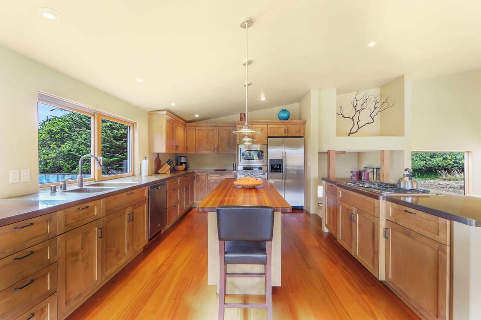 Craft culinary masterpieces in this well-equipped kitchen, designed for both functionality and the joy of cooking together.