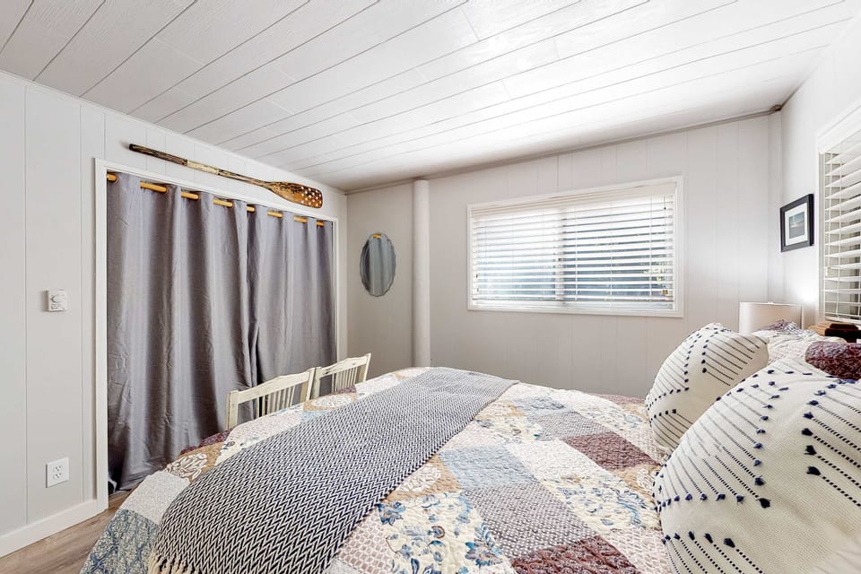 Unwind in the serene ambiance of the master bedroom, where comfort meets charm, creating the perfect haven for sweet dreams.