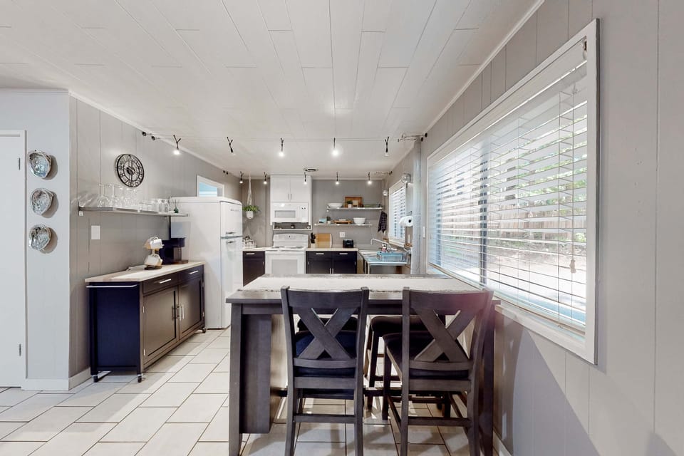 Cook up your favorite meals in the well-equipped kitchen, where culinary creativity meets the comforts of home.