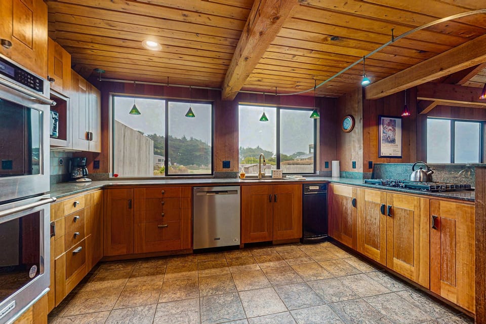 Cook with ease in this stylish kitchen, where the combination of rustic charm and modern amenities makes meal prep a delight.