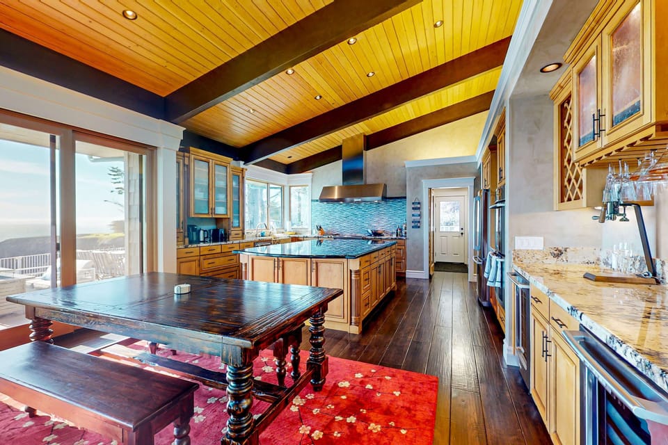Cook up culinary delights in this well-appointed kitchen, where ocean views inspire your next gourmet creation.