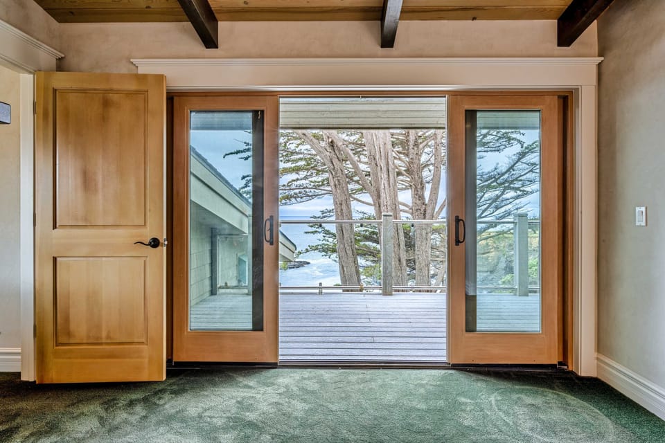 Open the doors to your outdoor sanctuary, where breathtaking ocean views await just steps from your living space.