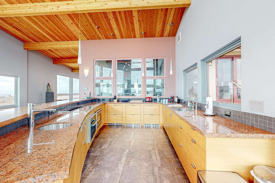 With ample counter space and modern appliances, this kitchen is perfect for both seasoned chefs and casual cooks to create delicious memories.
