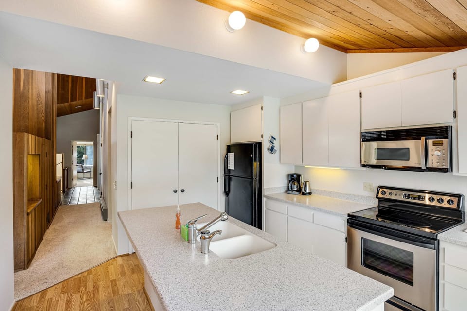 Craft culinary delights in this modern kitchen, where sleek design meets functionality for the perfect cooking experience.