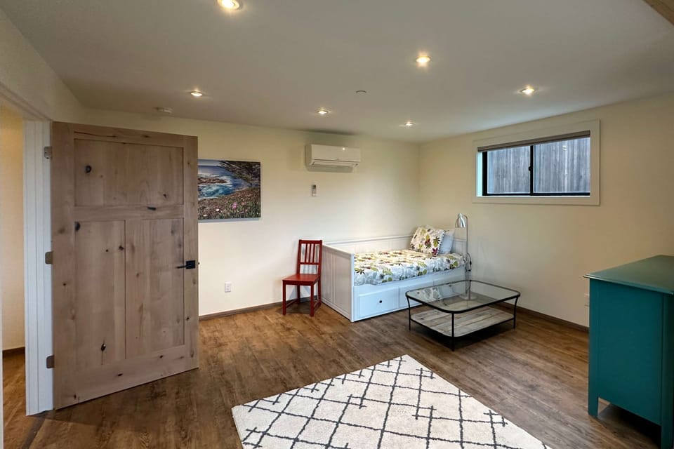This versatile bedroom offers a cozy retreat, perfect for kids or extra guests, where comfort meets functionality.