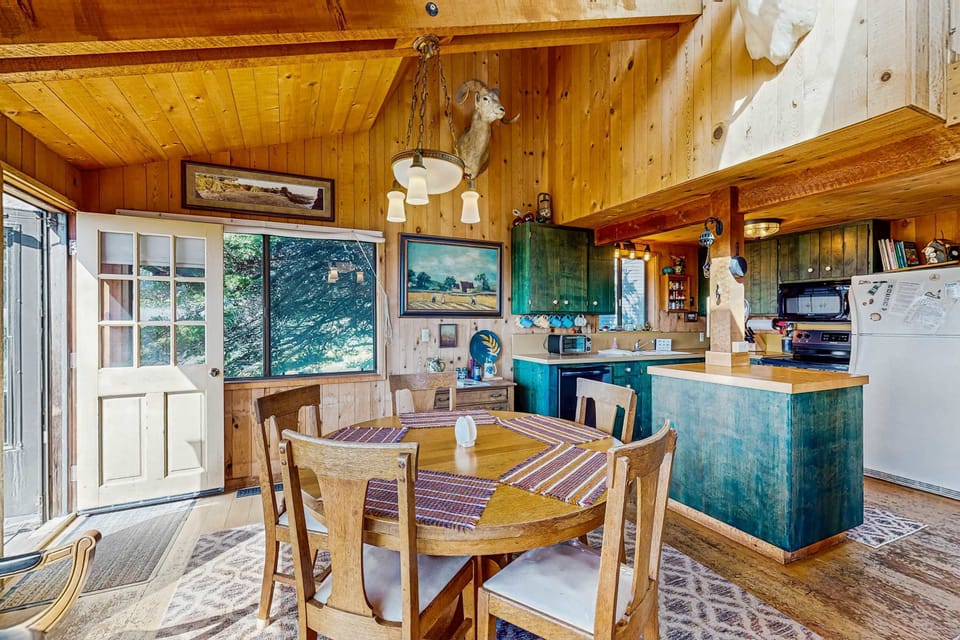 Cook up your favorite meals in this well-equipped kitchen, where every culinary creation can be enjoyed with a view.