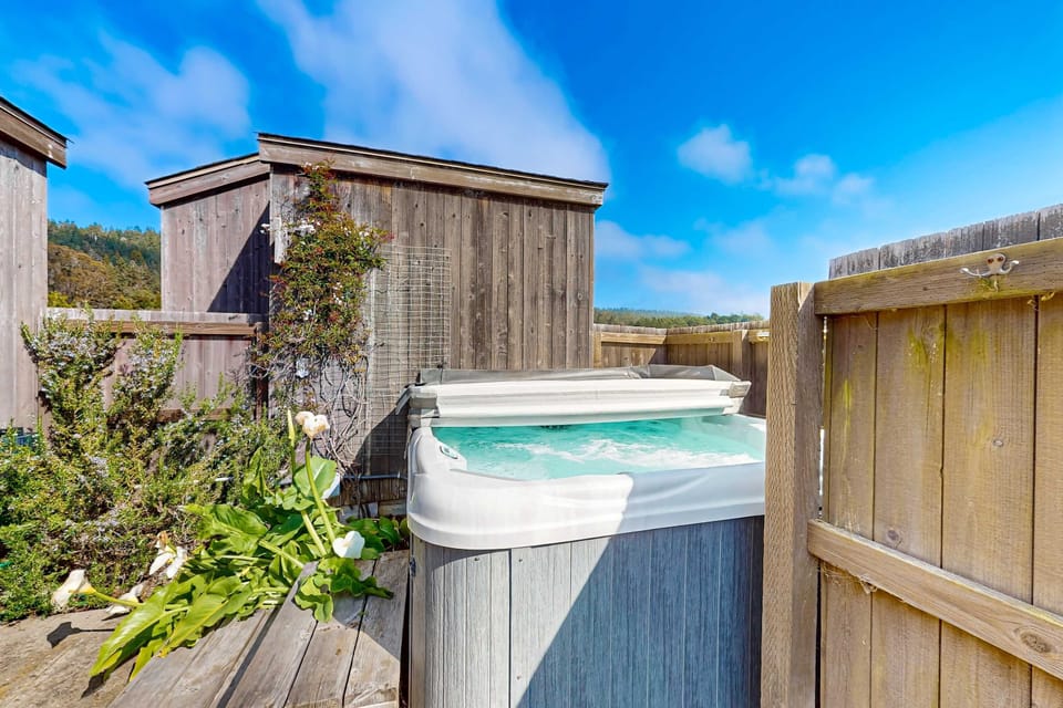 Soak away your cares in the private hot tub, surrounded by nature, perfect for stargazing after a day of exploration.