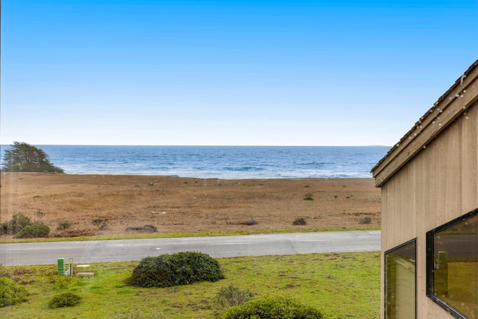 From this exterior view, soak in the beauty of the Pacific, just steps away from your tranquil getaway at Sea Ranch.