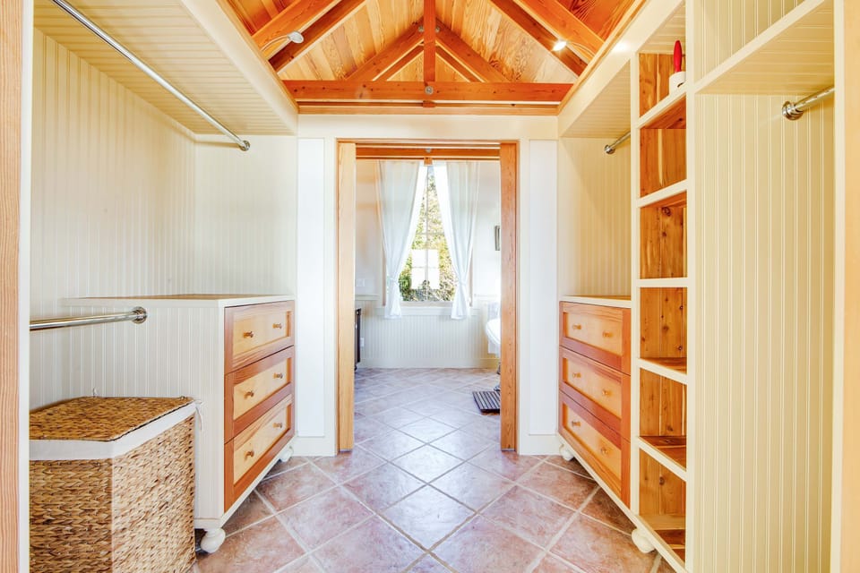 Stay organized during your getaway in this spacious closet, thoughtfully designed for all your vacation essentials.