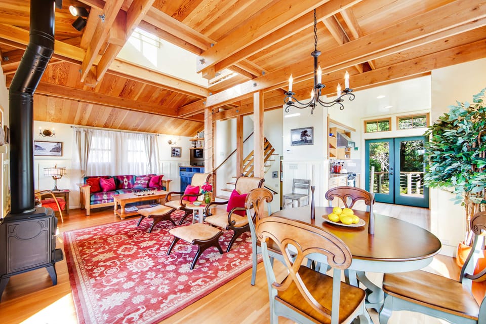 The open layout connects you to the heart of the home, ideal for enjoying meals and laughter amidst beautiful wood accents.