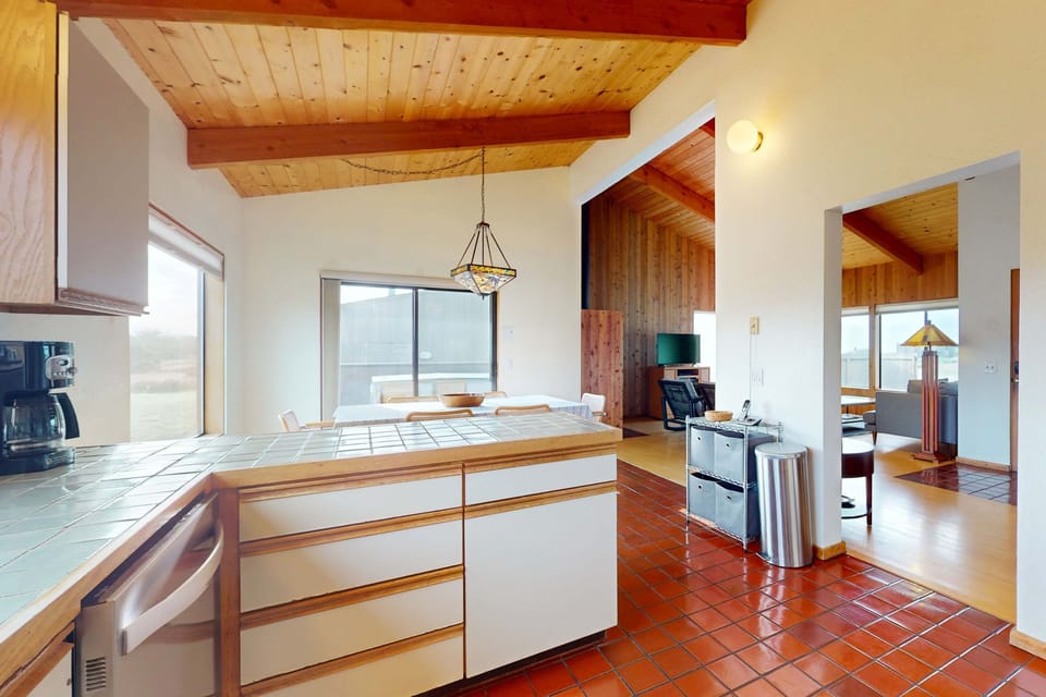 Experience seamless flow between cooking and dining with this open kitchen, designed for both intimate meals and lively gatherings.