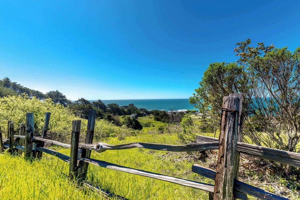 Wander through lush meadows leading to breathtaking ocean vistas, where every step brings you closer to nature's tranquil embrace.