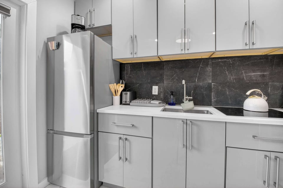 The airy kitchen offers ample space & all the comforts of home​