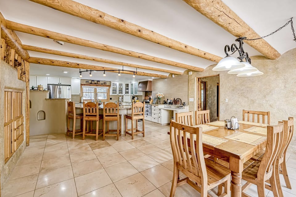 Pour morning coffee where the kitchen opens to the dining space