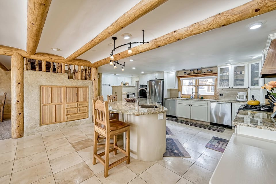 Cook together in the gourmet kitchen with island seating