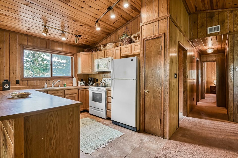 Find full-size appliances and easy flow to the dining area