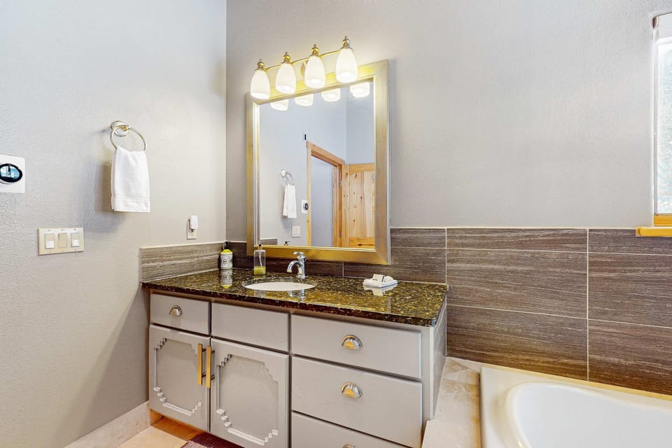 Get ready at the granite primary vanity