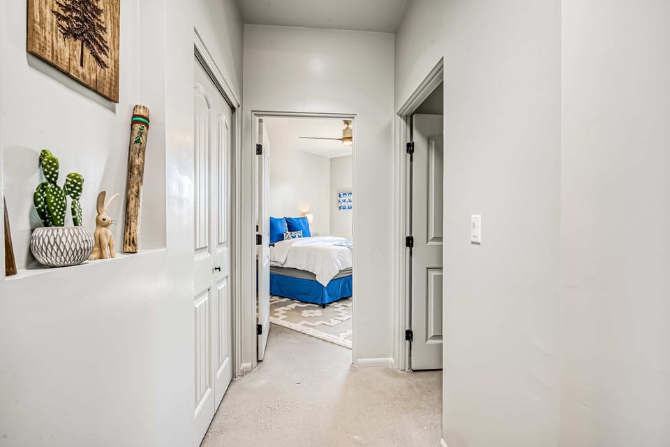 A third full bath down the hall serves the remaining bedrooms